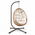 Sillón colgante de ratán sintético con cojines beige